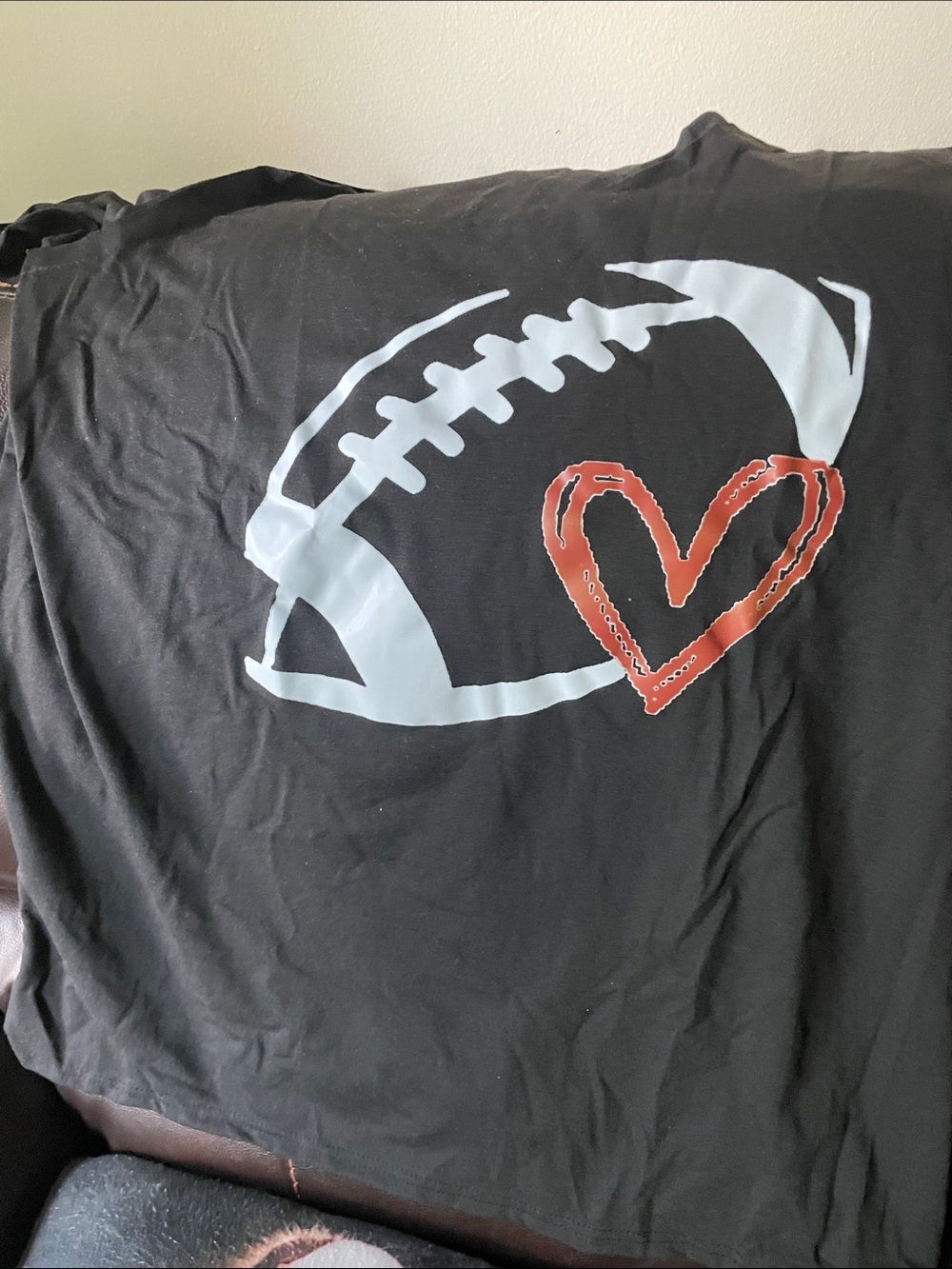 Woman’s Black Football Heart Graphic Tee